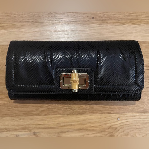 Banana Republic Handbags - Banana Republic women’s black snakeskin clutch bag LIKE NEW only used once
